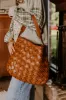 Chic Cityscape Faux Leather Woven Tote in Brown sold by Impressions