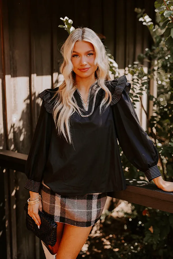 Chic Moment Ruffle Top in Black sold by Impressions