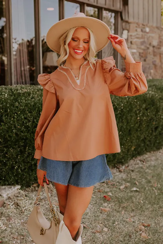 Chic Moment Ruffle Top in Camel sold by Impressions
