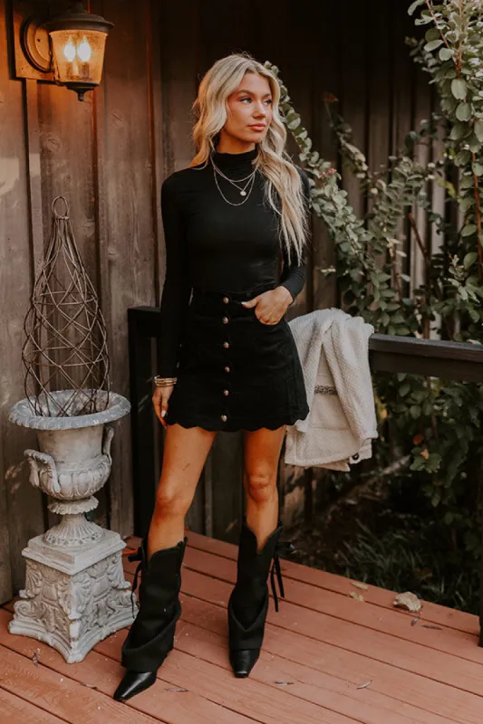 The Sienna High Waist Corduroy Mini Skirt in Black sold by Impressions