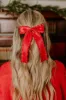 Cue The Charm Bow Hair Clip in Red sold by Impressions