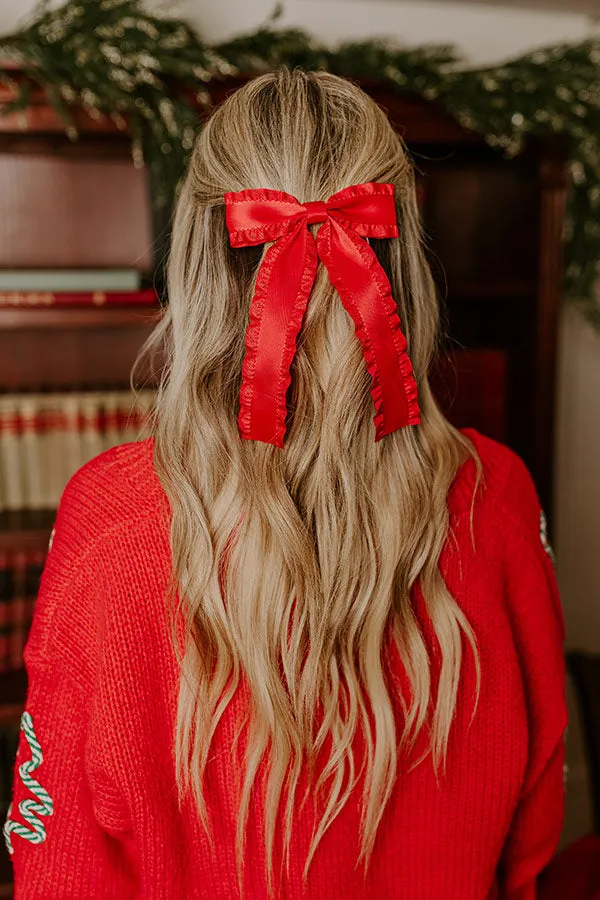 Cue The Charm Bow Hair Clip in Red sold by Impressions