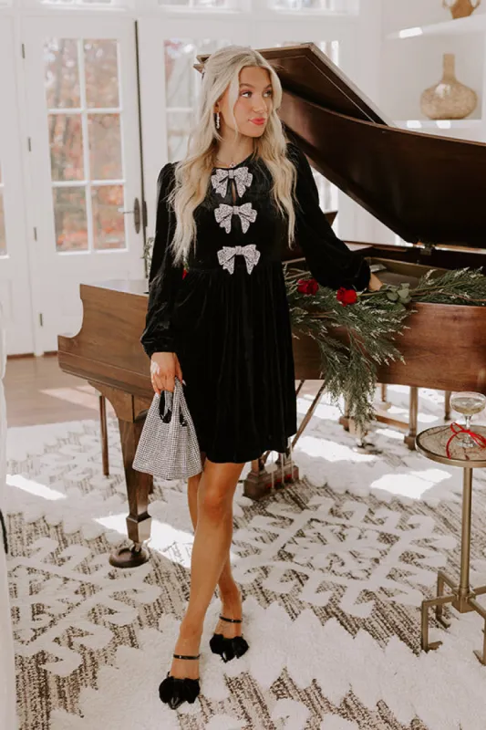 Bows And Kisses Velvet Mini Dress in Black sold by Impressions