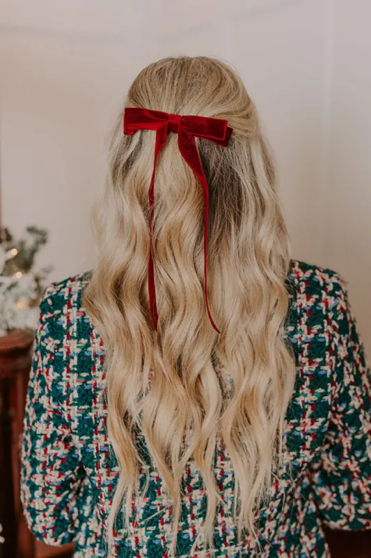 The Alice Long Velvet Bow Hair Clip in Wine sold by Impressions