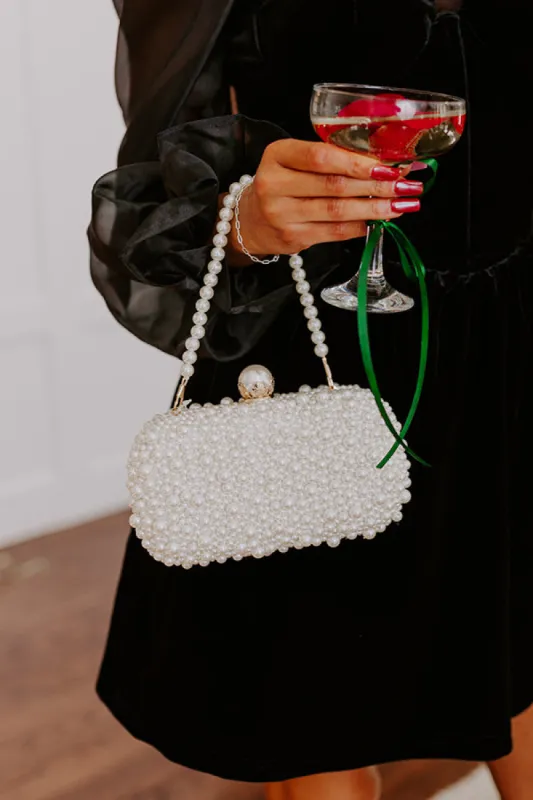Loving Glance Pearl Embellished Clutch sold by Impressions