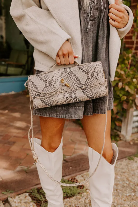 Exclusive Party Faux Leather Purse in Snake Print sold by Impressions
