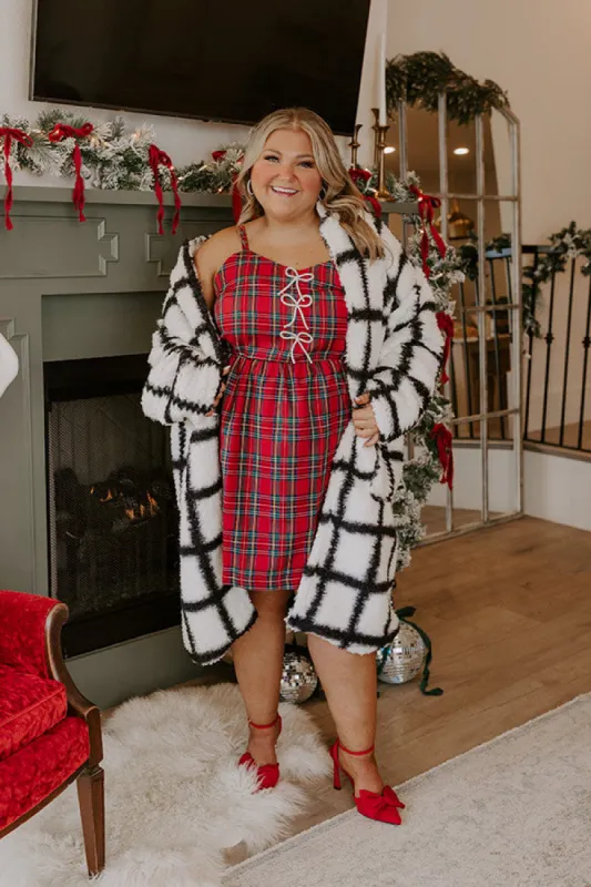 Kiss Under The Mistletoe Plaid Mini Dress Curves sold by Impressions