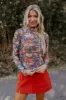 Call It Chic Floral Mesh Top in Blue sold by Impressions