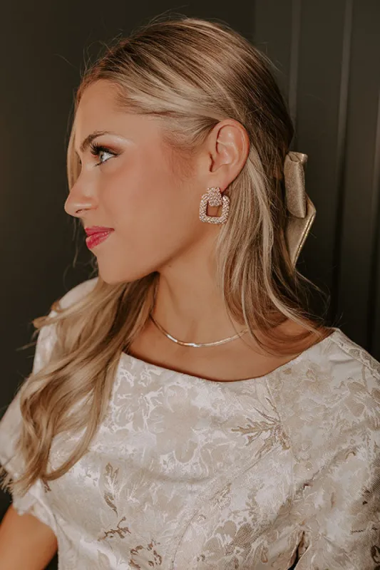 Sparkling Smile Earrings in Gold sold by Impressions