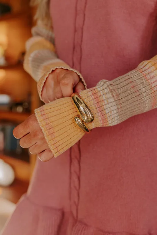 Cue The Chic Cuff Bracelet sold by Impressions