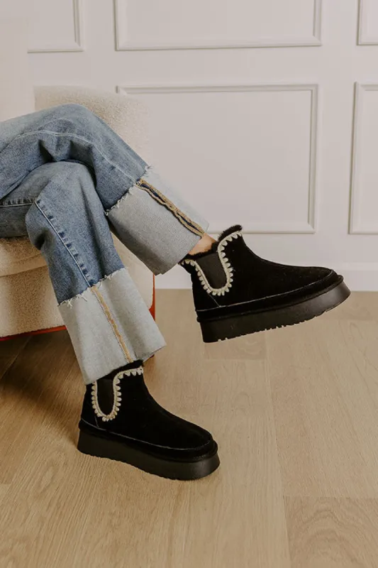 The Phoebe Faux Suede Platform Bootie in Black sold by Impressions
