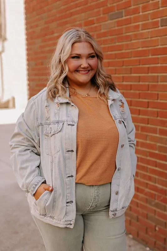 The Kimora Distressed Denim Jacket Curves sold by Impressions