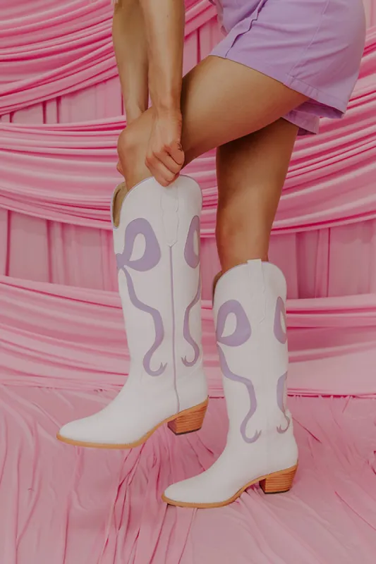 The Dolly Faux Leather Cowboy Boot in Lavender sold by Impressions