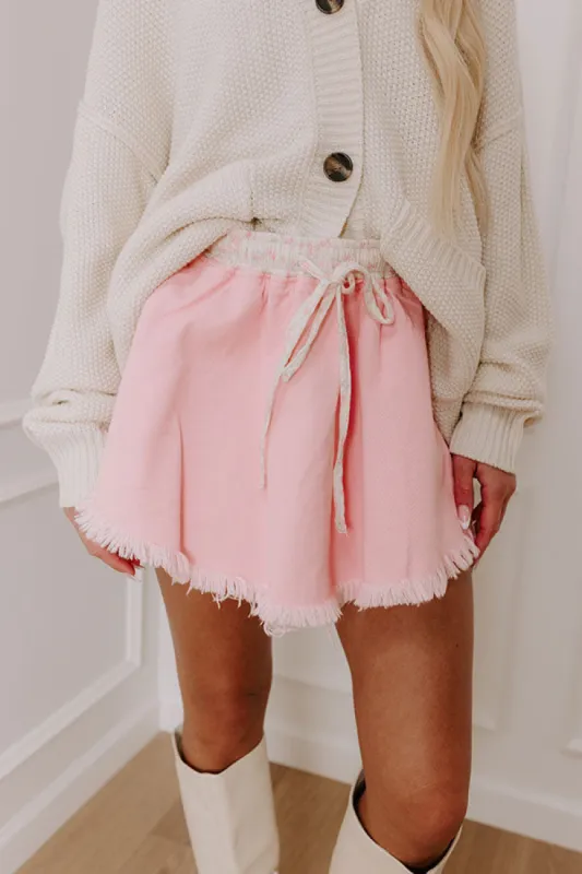 The Cherish High Waist Denim Skort in Pink sold by Impressions