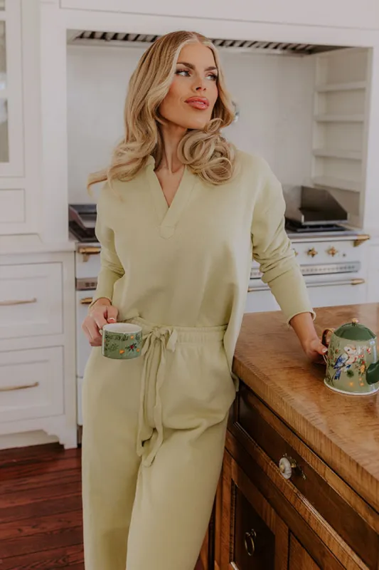 Cozy Cues Sweatshirt in Light Chartreuse sold by Impressions