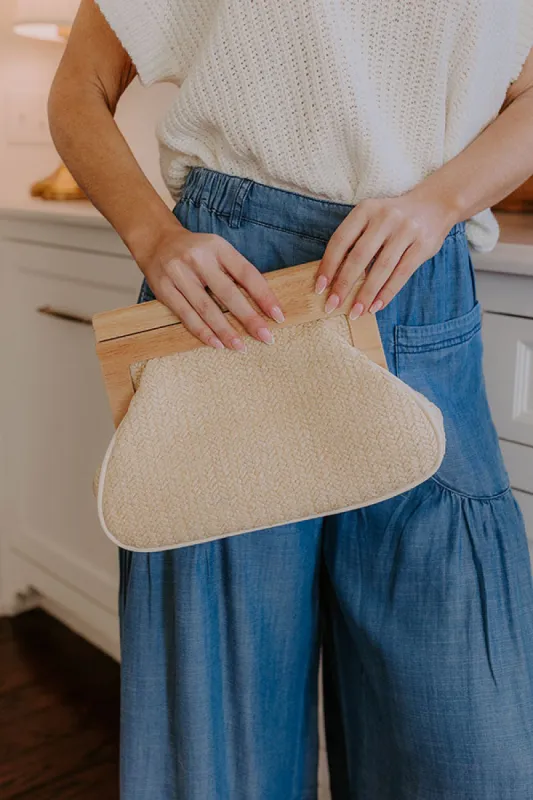 Vacay Mode Raffia Woven Clutch sold by Impressions