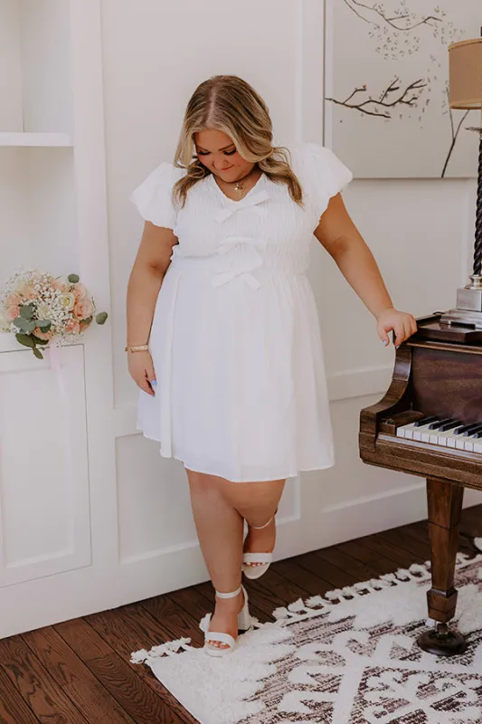 Coquette Dreams Smocked Mini Dress Curves sold by Impressions