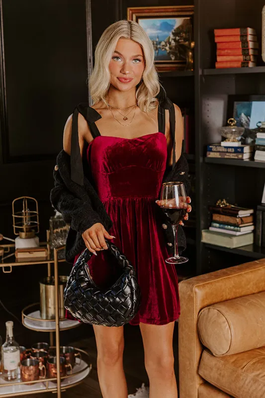 Let's Have A Toast Velvet Mini Dress in Wine sold by Impressions