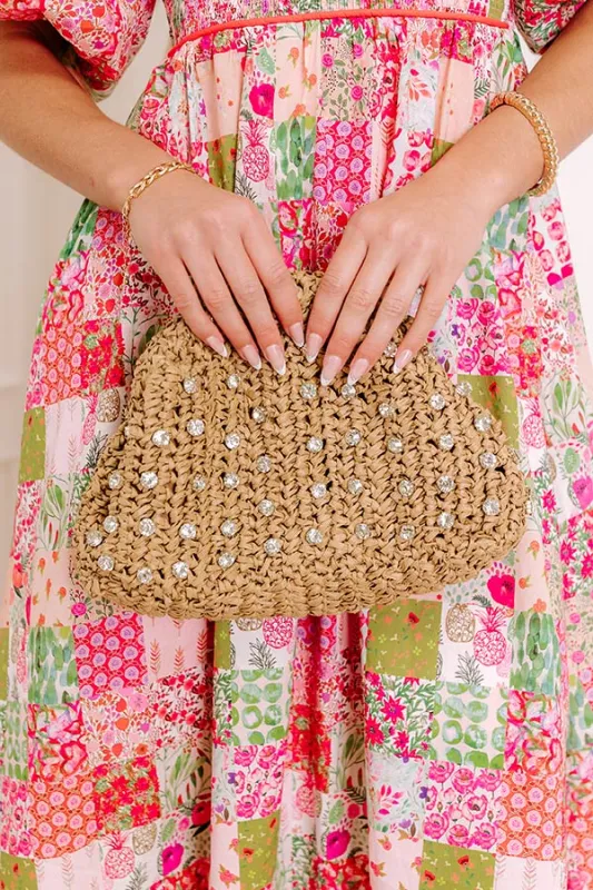 The Isla Embellished Woven Clutch sold by Impressions