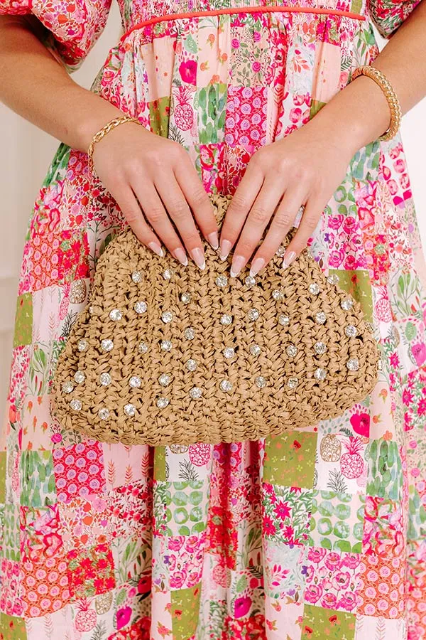 The Isla Embellished Woven Clutch sold by Impressions