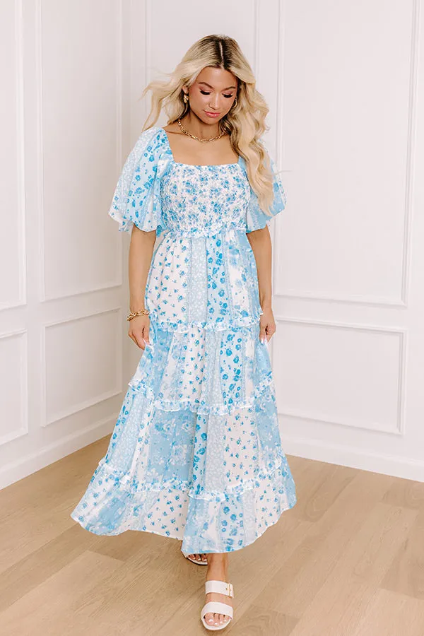 Floral Galore Smocked Maxi Dress in Sky Blue sold by Impressions
