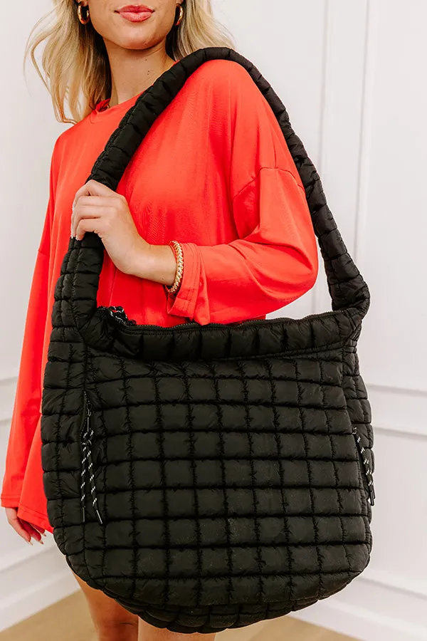 The Leda Quilted Puffer Tote in Black sold by Impressions