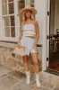 The Alice High Waist Denim Skort in Light Wash sold by Impressions
