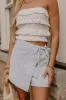 The Alice High Waist Denim Skort in Light Wash sold by Impressions