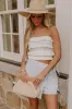 The Alice High Waist Denim Skort in Light Wash sold by Impressions
