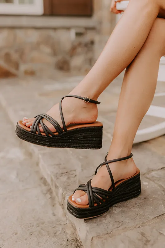 The Kinsley Faux Leather Wedge in Black sold by Impressions