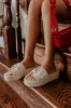The Itzel Raffia Woven Sandal sold by Impressions