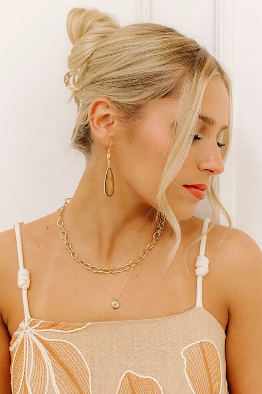 Charming Smile Drop Earrings in Mocha sold by Impressions