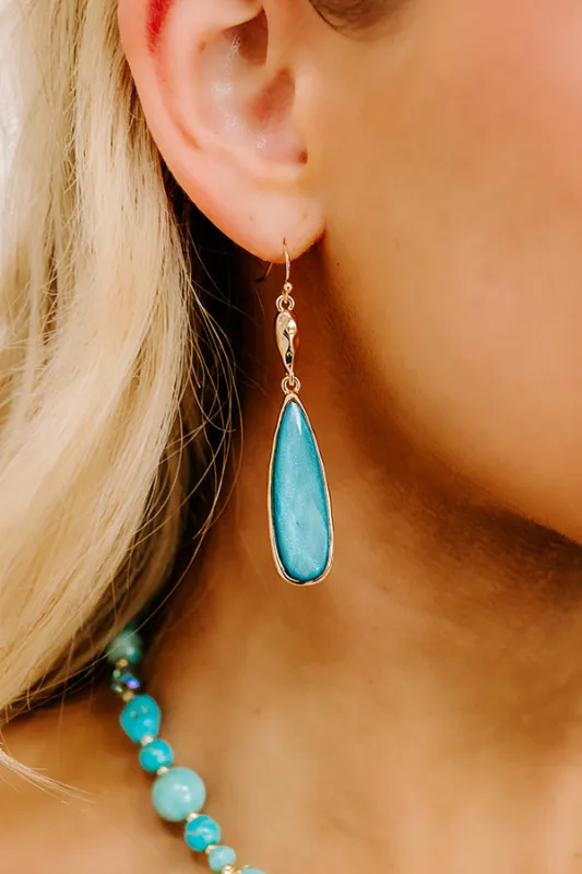 Charming Smile Drop Earrings in Turquoise sold by Impressions