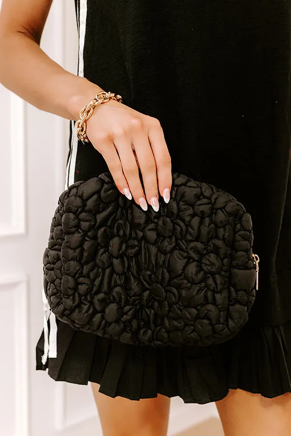 The Flora Puffer Cosmetic Bag in Black sold by Impressions