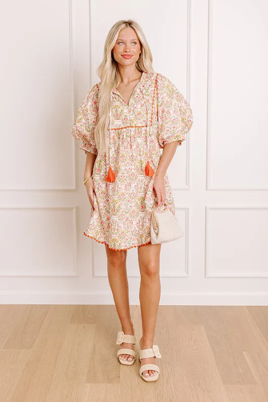 Tea Garden Charm Floral Mini Dress in Orange sold by Impressions