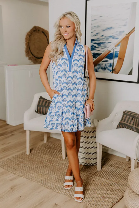 Get Into The Groove Floral Mini Dress in Sky Blue sold by Impressions