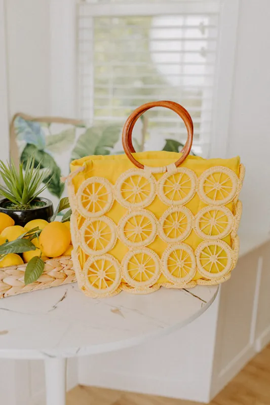 Citrus Grove Woven Tote in Yellow sold by Impressions