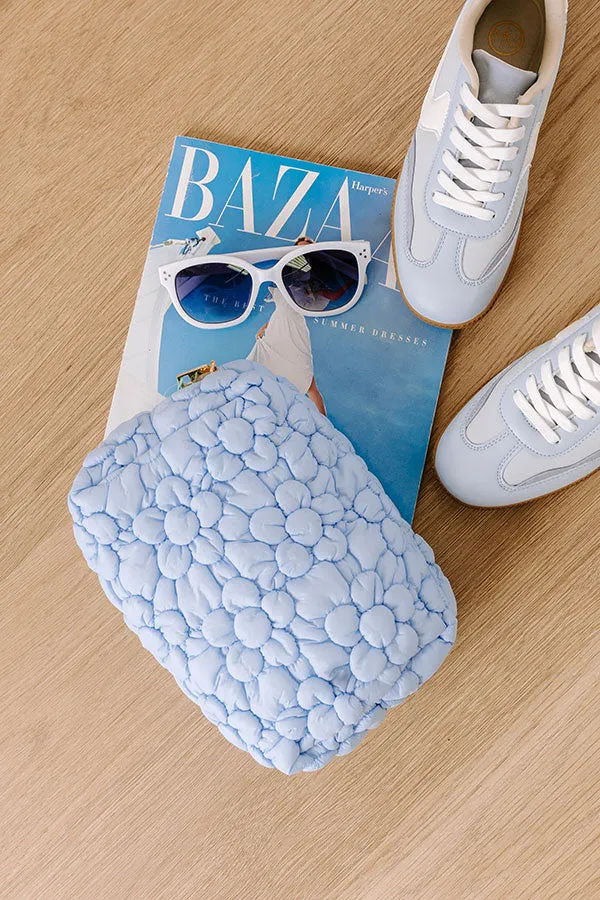 The Flora Puffer Cosmetic Bag in Sky Blue sold by Impressions