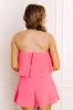 Flirty Feels Romper in Pink sold by Impressions