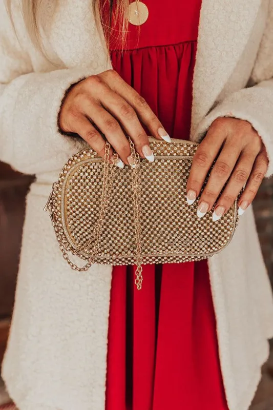 Champagne Getaway Rhinestone Clutch In Gold sold by Impressions