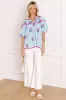 Joyful Bloom Floral Embroidered Top in Sky Blue sold by Impressions
