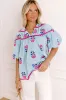 Joyful Bloom Floral Embroidered Top in Sky Blue sold by Impressions