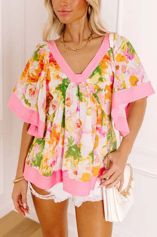 Sweet Energy Floral Top sold by Impressions