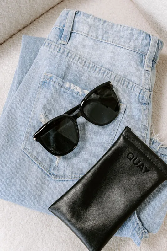 Quay Rent Free Polarized Sunnies in Black sold by Impressions