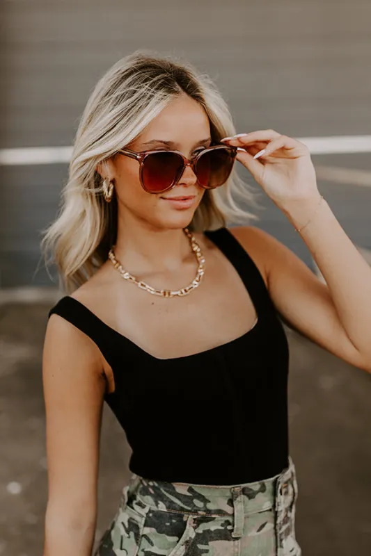 Quay Rent Free Sunnies in Brown sold by Impressions