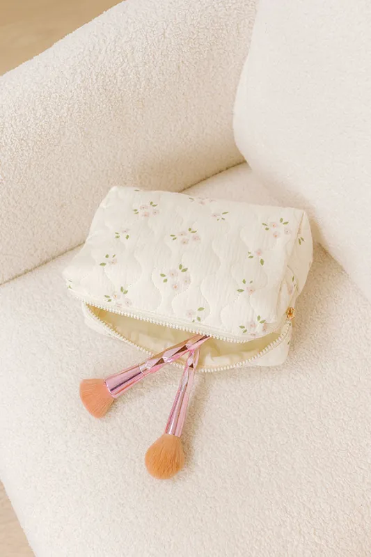 Quilted Keeper Cosmetic Bag in Floral Print sold by Impressions
