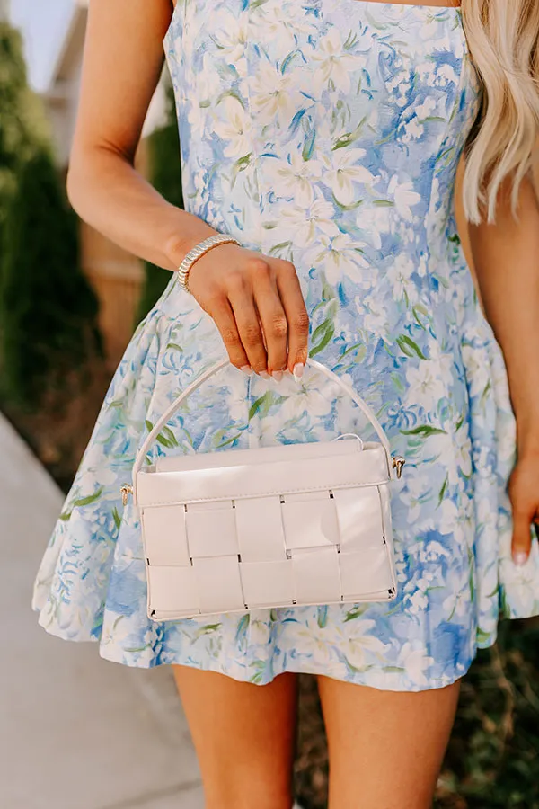 Aurora Faux Leather Woven Purse in Cream sold by Impressions