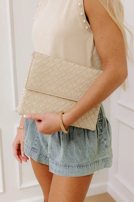 Ivy Faux Leather Woven Clutch sold by Impressions