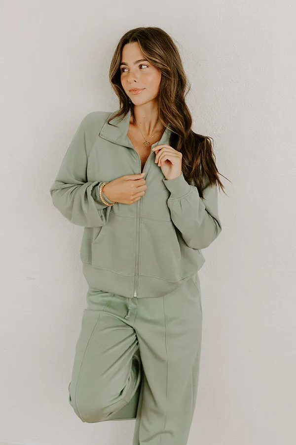 Morning Dew Scuba Zip-Up Sweater in Sage sold by Impressions