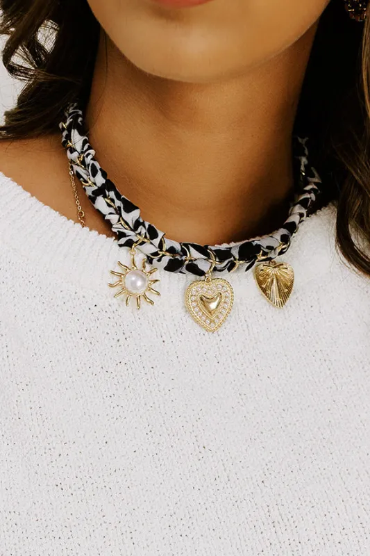 Leopard Love Charm Necklace in Grey sold by Impressions